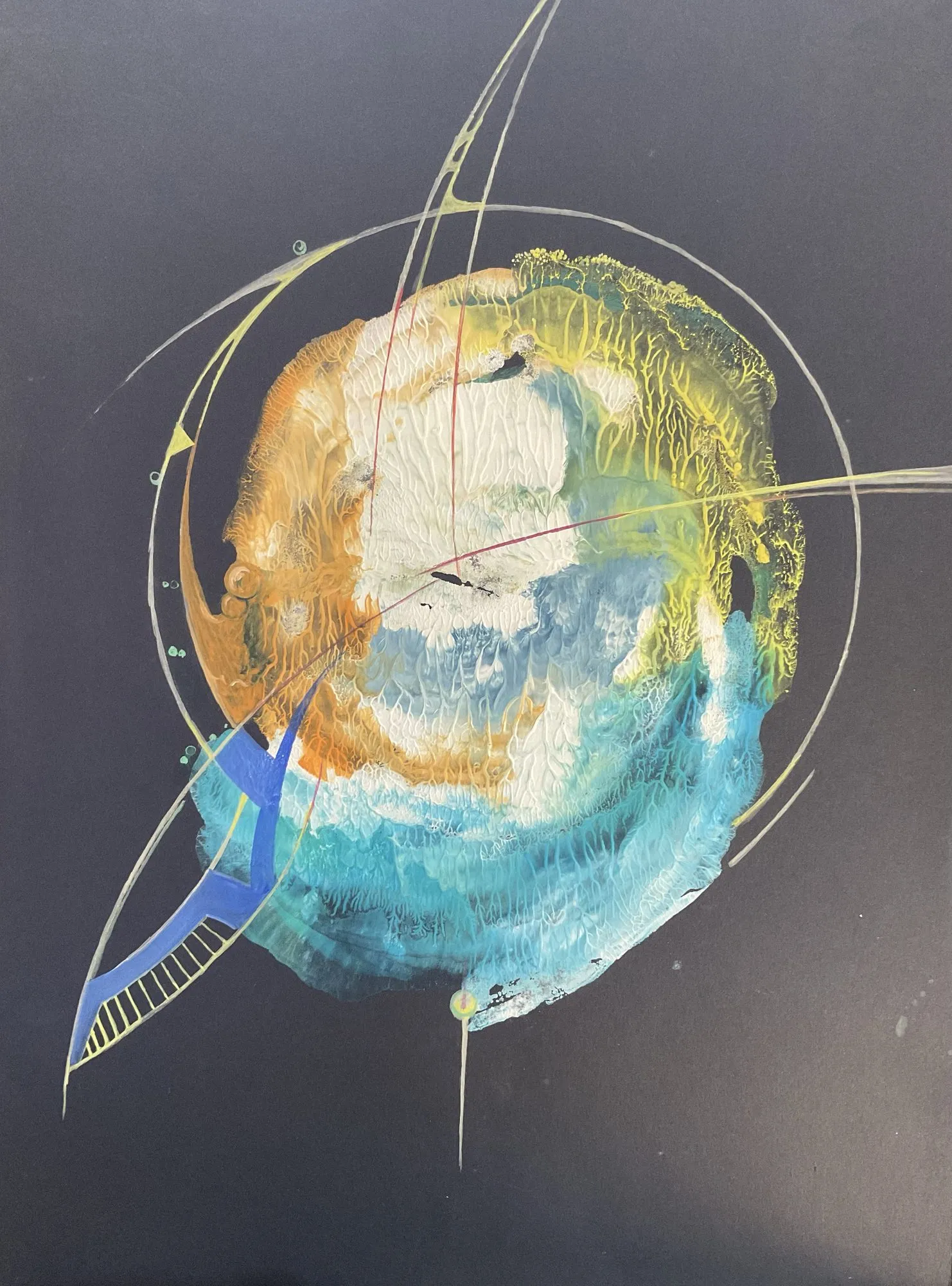 Work on paper by Oleksandr Zinovyev: A turquoise and gold globe-like blot circled by thin lines on dark grey paper.