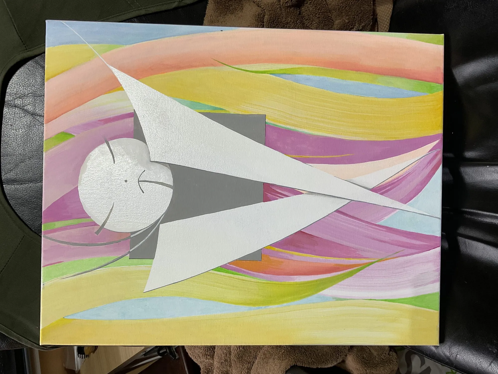 Work on paper “The Japanese Woman” by Oleksandr Zinovyev: White and grey triangles over flowing pastel ribbons; photographed at an angle.