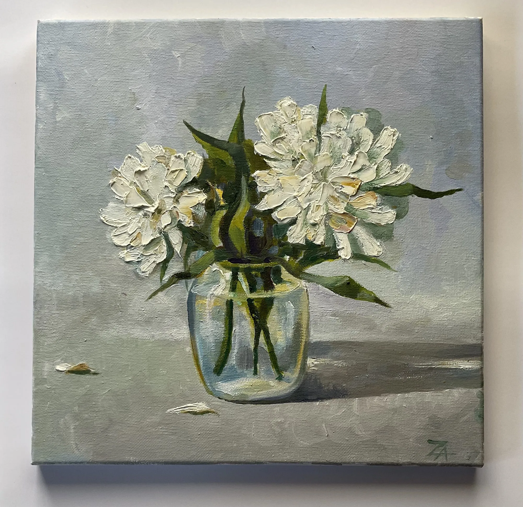 Painting “White Flowers” by Oleksandr Zinovyev: White peonies in a clear glass jar on a grey table.